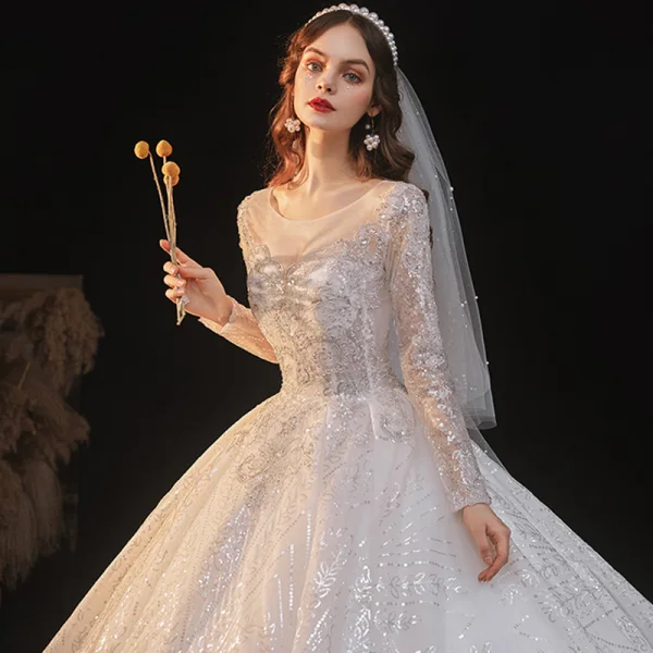 Sparkly Ivory See-through Bridal Wedding Dresses 2021 Ball Gown Scoop Neck Long Sleeve Backless Beading Sequins Cathedral Train Ruffle
