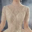 Vintage / Originale Champagne Transparentes La Mariée Robe De Mariée 2021 Robe Boule Col Haut Manches Courtes Dos Nu Appliques En Dentelle Perlage Paillettes Cathedral Train Volants
