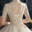 Vintage / Originale Champagne Transparentes La Mariée Robe De Mariée 2021 Robe Boule Col Haut Manches Courtes Dos Nu Appliques En Dentelle Perlage Paillettes Cathedral Train Volants