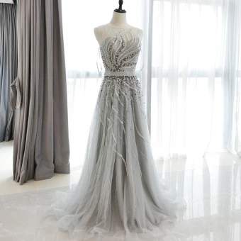 Haut De Gamme Gris Tapis Rouge Robe De Soirée 2021 Princesse Transparentes Encolure Dégagée Sans Manches Perlage Paillettes Ceinture Longue Volants Robe De Ceremonie