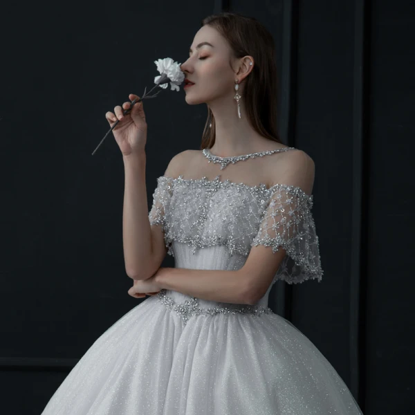 Luxury / Gorgeous Champagne See-through Bridal Wedding Dresses 2021 Ball Gown Scoop Neck Short Sleeve Backless Beading Sequins Glitter Tulle Cathedral Train Ruffle