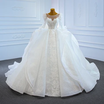 Luxe Blanche Gonflée La Mariée Robe De Mariée 2021 Robe Boule Transparentes Encolure Dégagée Manches Longues Dos Nu Appliques En Dentelle Perlage Chapel Train Volants
