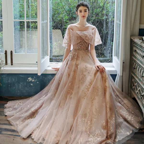 Bling Bling Champagne Transparentes Robe De Bal 2021 Princesse Encolure Carrée Sans Manches Perlage Glitter Appliques Train De Balayage Volants Dos Nu Robe De Ceremonie