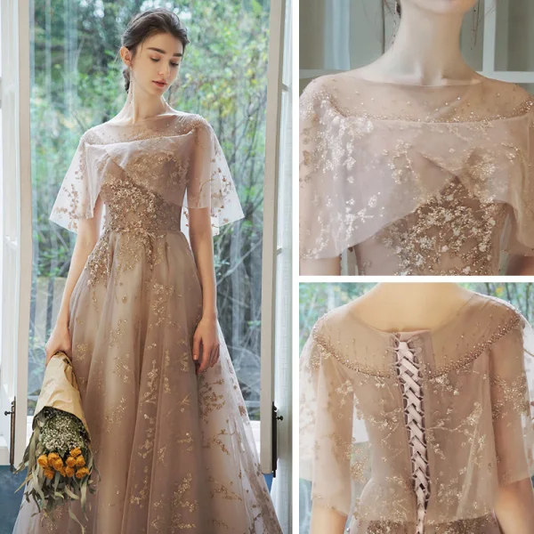 Bling Bling Champagne Transparentes Robe De Bal 2021 Princesse Encolure Carrée Sans Manches Perlage Glitter Appliques Train De Balayage Volants Dos Nu Robe De Ceremonie