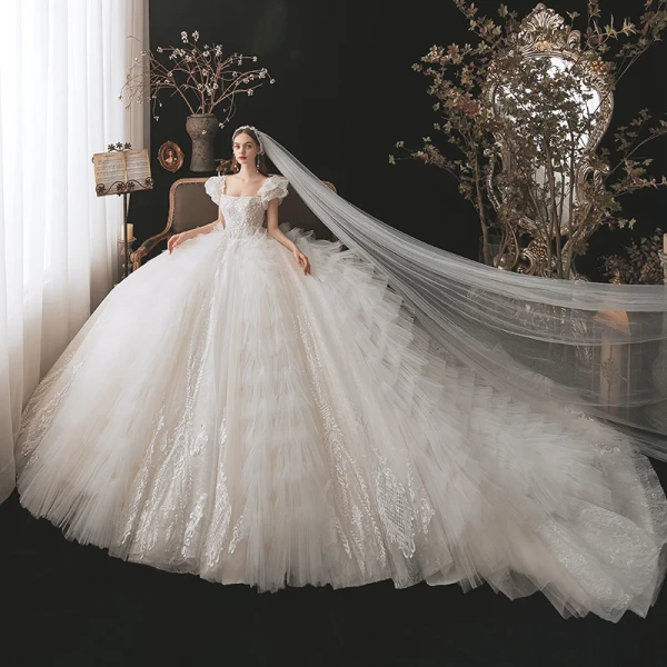 Vintage Champagner Hochzeits Brautkleider / Hochzeitskleider 2021 Ballkleid Eckiger Ausschnitt Abnehmbar Geschwollenes Lange Ärmel Rückenfreies Applikationen Spitze Perlenstickerei Kathedrale Schleppe Fallende Rüsche