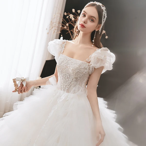 Vintage Champagner Hochzeits Brautkleider / Hochzeitskleider 2021 Ballkleid Eckiger Ausschnitt Abnehmbar Geschwollenes Lange Ärmel Rückenfreies Applikationen Spitze Perlenstickerei Kathedrale Schleppe Fallende Rüsche