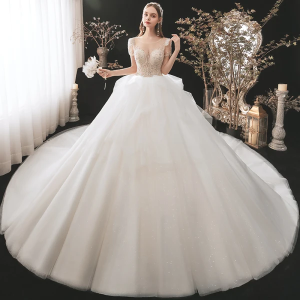 Illusion Champagne La Mariée Robe De Mariée 2021 Robe Boule Transparentes Encolure Dégagée Manches Courtes Dos Nu Paillettes Perlage Glitter Tulle Cathedral Train Volants