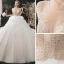Illusion Champagne La Mariée Robe De Mariée 2021 Robe Boule Transparentes Encolure Dégagée Manches Courtes Dos Nu Paillettes Perlage Glitter Tulle Cathedral Train Volants