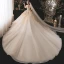 Charmant Champagne Transparentes La Mariée Robe De Mariée 2021 Robe Boule De l'épaule Manches Courtes Dos Nu Appliques En Dentelle Paillettes Perlage Glitter Tulle Cathedral Train Volants
