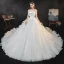 High-end Ivory Organza Bridal Wedding Dresses 2021 Ball Gown Strapless Sleeveless Backless Appliques Lace Sequins Beading Cathedral Train Ruffle