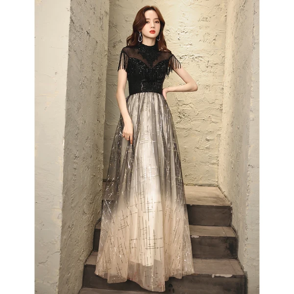 Vintage Sorte Gradient Farve Hvide Dancing Gallakjoler 2021 Prinsesse Gennemsigtig Høj Hals Ærmeløs Beading Tassel Pailletter Lange Flæse