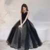 Elegant Black Dancing Prom Dresses 2021 A-Line / Princess Spaghetti Straps Sleeveless Glitter Tulle Floor-Length / Long Ruffle Backless Formal Dresses