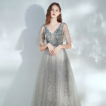 Elegant Silver Dancing Prom Dresses 2021 A Line Princess Deep V Neck Sleeveless Sequins Spotted Tulle Floor Length Long Ruffle Backless Formal Dresses