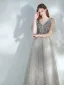 Élégant Argenté Dansant Robe De Bal 2021 Princesse Col v profond Sans Manches Paillettes Tachetée Tulle Longue Volants Dos Nu Robe De Ceremonie