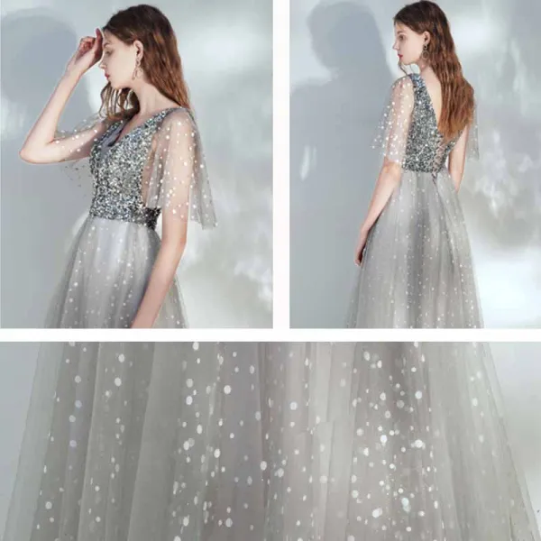 Élégant Argenté Dansant Robe De Bal 2021 Princesse Col v profond Sans Manches Paillettes Tachetée Tulle Longue Volants Dos Nu Robe De Ceremonie