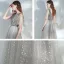 Élégant Argenté Dansant Robe De Bal 2021 Princesse Col v profond Sans Manches Paillettes Tachetée Tulle Longue Volants Dos Nu Robe De Ceremonie