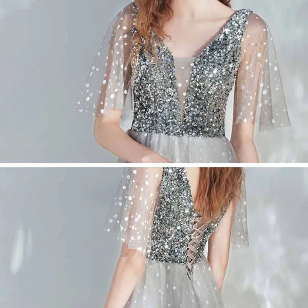 Élégant Argenté Dansant Robe De Bal 2021 Princesse Col v profond Sans Manches Paillettes Tachetée Tulle Longue Volants Dos Nu Robe De Ceremonie