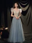 Illusion Bleu Ciel Transparentes Robe De Bal 2021 Princesse Col v profond Sans Manches Perlage Paillettes Glitter Tulle Train De Balayage Volants Dos Nu Robe De Ceremonie