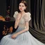 Illusion Bleu Ciel Transparentes Robe De Bal 2021 Princesse Col v profond Sans Manches Perlage Paillettes Glitter Tulle Train De Balayage Volants Dos Nu Robe De Ceremonie