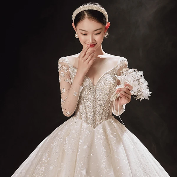 Luxury / Gorgeous Champagne Bridal Wedding Dresses 2021 Ball Gown See-through V-Neck Long Sleeve Backless Appliques Lace Beading Sequins Cathedral Train Ruffle
