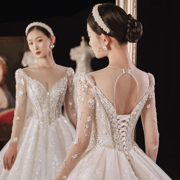 Luxury / Gorgeous Champagne Bridal Wedding Dresses 2021 Ball Gown See-through V-Neck Long Sleeve Backless Appliques Lace Beading Sequins Cathedral Train Ruffle