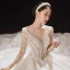 Luxury / Gorgeous Champagne Bridal Wedding Dresses 2021 Ball Gown See-through V-Neck Long Sleeve Backless Appliques Lace Beading Sequins Cathedral Train Ruffle