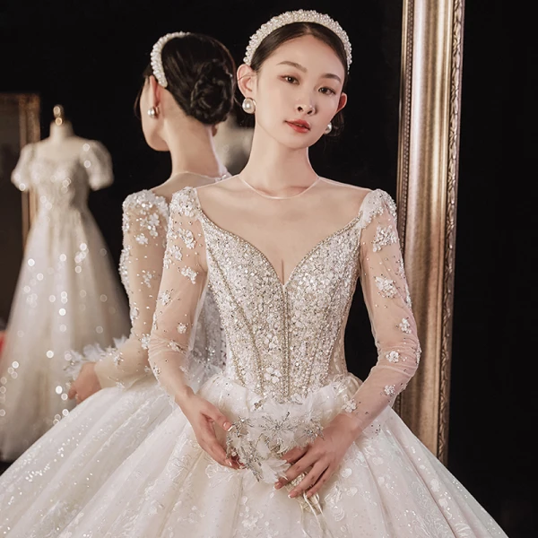 Luxury / Gorgeous Champagne Bridal Wedding Dresses 2021 Ball Gown See-through V-Neck Long Sleeve Backless Appliques Lace Beading Sequins Cathedral Train Ruffle