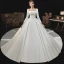 Haut de Gamme Ivoire Satin Transparentes La Mariée Robe De Mariée 2021 Robe Boule Encolure Carrée Manches Longues Cathedral Train Volants