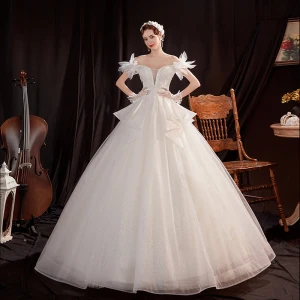 Asequible Marfil Exterior Jardín Vestidos De Novia 2021 Ball Gown Fuera Del Hombro Manga Corta Sin Espalda Apliques Con Encaje Rebordear Glitter Tul Largos Ruffle