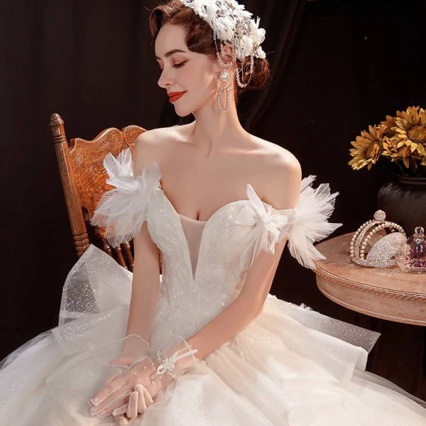 Affordable Ivory Outdoor / Garden Wedding Dresses 2021 Ball Gown Off-The-Shoulder Short Sleeve Backless Appliques Lace Beading Glitter Tulle Floor-Length / Long Ruffle
