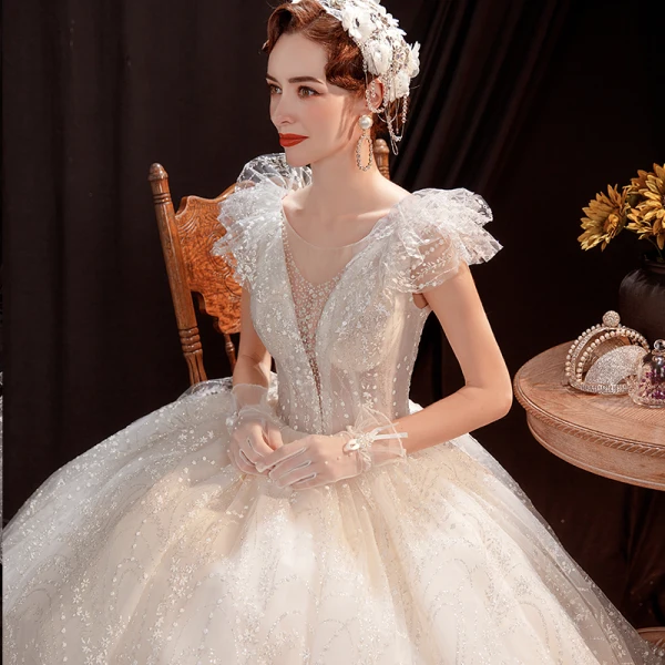 Abordable Ivoire Robe De Mariée 2021 Robe Boule Transparentes Col v profond Sans Manches Dos Nu Perlage Glitter Tulle Longue Volants