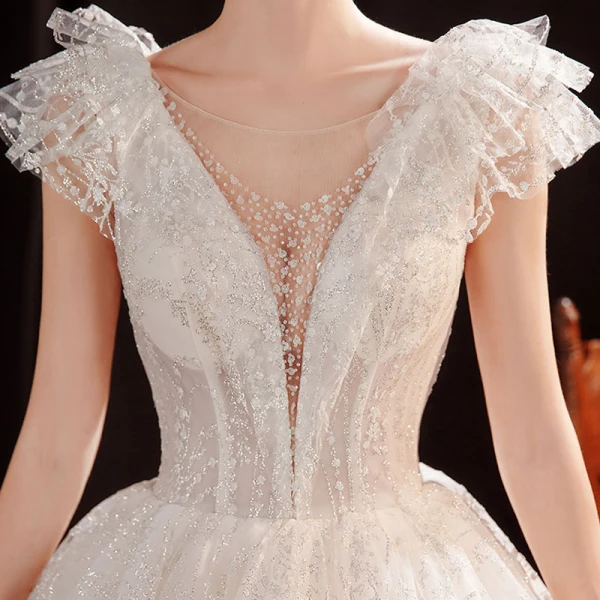 Abordable Ivoire Robe De Mariée 2021 Robe Boule Transparentes Col v profond Sans Manches Dos Nu Perlage Glitter Tulle Longue Volants