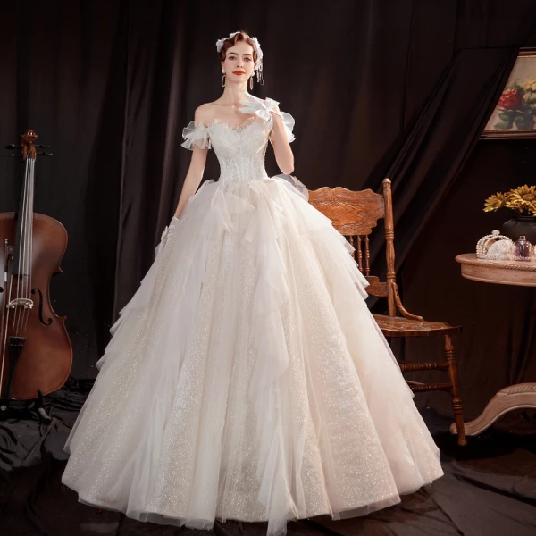 Affordable Champagne Outdoor / Garden Wedding Dresses 2021 Ball Gown Off-The-Shoulder Short Sleeve Backless Beading Glitter Tulle Floor-Length / Long Ruffle