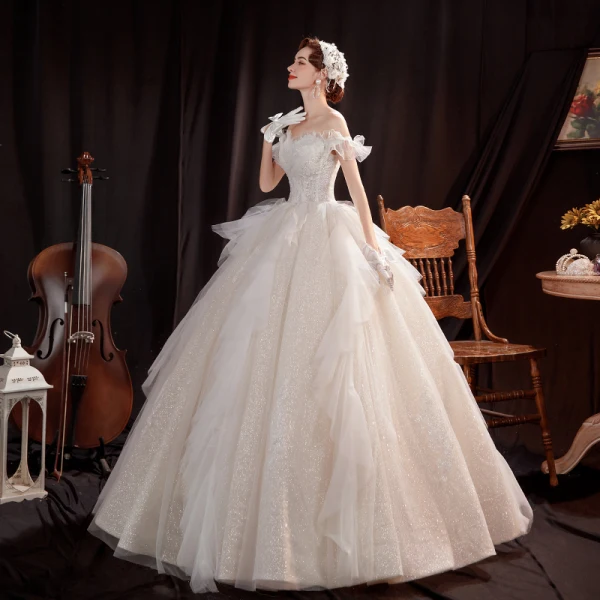 Affordable Champagne Outdoor / Garden Wedding Dresses 2021 Ball Gown Off-The-Shoulder Short Sleeve Backless Beading Glitter Tulle Floor-Length / Long Ruffle