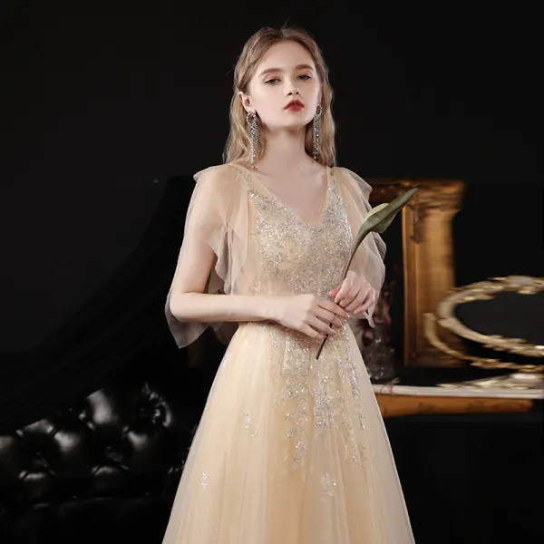 Chic / Beautiful Champagne Dancing Prom Dresses 2021 A-Line / Princess V-Neck Sleeveless Beading Sequins Glitter Tulle Floor-Length / Long Ruffle Backless Formal Dresses
