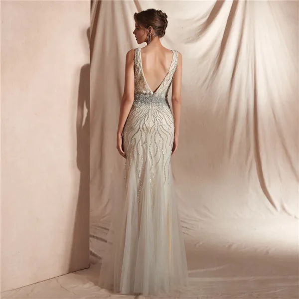 Haut de Gamme Champagne Robe De Soirée 2020 Trompette / Sirène Col v profond Sans Manches Paillettes Perlage Longue Volants Dos Nu Robe De Ceremonie