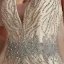 Haut de Gamme Champagne Robe De Soirée 2020 Trompette / Sirène Col v profond Sans Manches Paillettes Perlage Longue Volants Dos Nu Robe De Ceremonie