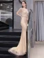 Haut de Gamme Doré Transparentes Robe De Soirée 2020 Trompette / Sirène V-Cou Manches Courtes Ceinture Perlage Train De Balayage Volants Robe De Ceremonie