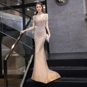 Sexy Luxury Gorgeous Gold Red Carpet Evening Dresses 2020 Trumpet Mermaid Deep V Neck Short Sleeve Handmade Beading Pearl Sweep Train Ruffle Backless