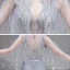 Illusion Haut de Gamme Gris Tapis rouge Transparentes Robe De Soirée Avec Châle 2020 Trompette / Sirène Col v profond Sans Manches Plumes Perlage Train De Balayage Volants Dos Nu Robe De Ceremonie