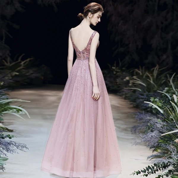 High End Rosa Abendkleider 2020 A Linie Durchsichtige Tiefer V-Ausschnitt Ärmellos Perlenstickerei Perle Strass Stoffgürtel Lange Rüschen Rückenfreies Festliche Kleider