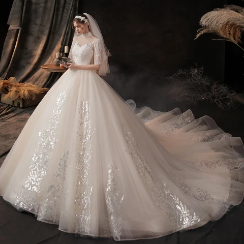 Vintage Champán Transparentes Boda Vestidos De Novia 2020 Ball Gown Cuello Alto Manga Corta Apliques Con Encaje Rebordear Chapel Train Ruffle