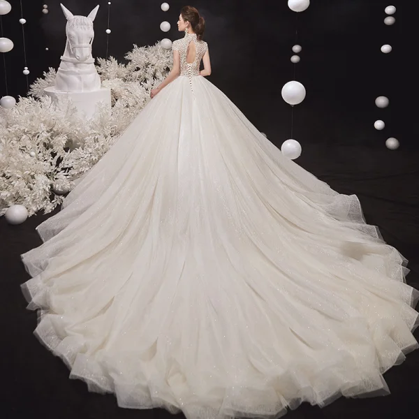 Illusion Champagne Bridal Wedding Dresses 2020 Ball Gown High Neck Short Sleeve Backless Beading Glitter Tulle Cathedral Train Ruffle