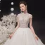 Illusion Champagne Bridal Wedding Dresses 2020 Ball Gown High Neck Short Sleeve Backless Beading Glitter Tulle Cathedral Train Ruffle