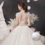 Illusion Champagne Bridal Wedding Dresses 2020 Ball Gown High Neck Short Sleeve Backless Beading Glitter Tulle Cathedral Train Ruffle
