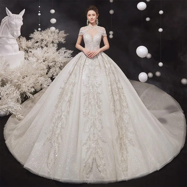 Luxury / Gorgeous Champagne See-through Bridal Wedding Dresses 2020 Ball Gown High Neck Short Sleeve Appliques Lace Beading Tassel Glitter Tulle Cathedral Train