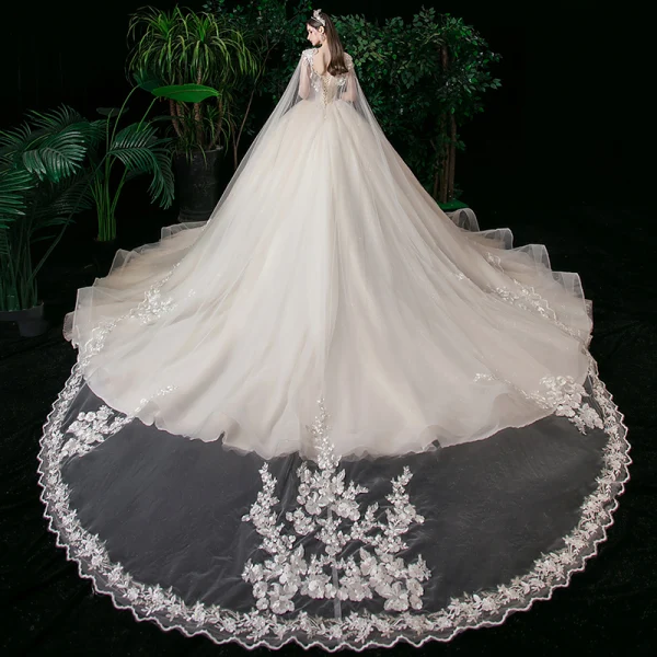 Romantic Champagne See-through Bridal Wedding Dresses 2020 Ball Gown Scoop Neck Sleeveless Backless Appliques Lace Beading Glitter Tulle Watteau Train Ruffle