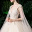 Romantic Champagne See-through Bridal Wedding Dresses 2020 Ball Gown Scoop Neck Sleeveless Backless Appliques Lace Beading Glitter Tulle Watteau Train Ruffle