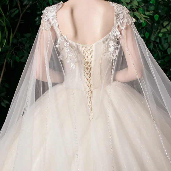 Romantic Champagne See-through Bridal Wedding Dresses 2020 Ball Gown Scoop Neck Sleeveless Backless Appliques Lace Beading Glitter Tulle Watteau Train Ruffle