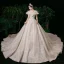 Élégant Champagne Transparentes La Mariée Robe De Mariée 2020 Robe Boule Encolure Carrée Manches Courtes Dos Nu Appliques En Dentelle Glitter Tulle Perlage Cathedral Train Volants